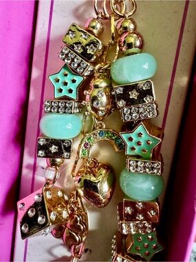 New in the box Studio Mint and Gold Beaded Bag Charm Keychain